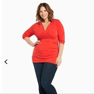 Torrid red with black lace top. NWT size 2.